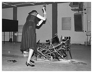 Performance And this ladies and gentlemen was the destruction of six Thonet- chairs tied with a rope into a circle and several eggs (1984) in De Fabriek Eindhoven. foto Peter Cox.